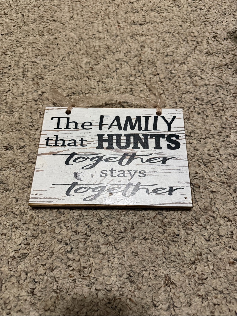 Rustic White Wooden Wall Sign "The Family That Hunts Together"